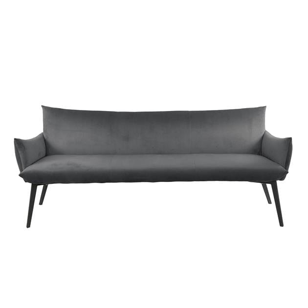 Gros plan sur l&#39;assise en velours du banc de salle à manger, mettant en avant sa texture douce.