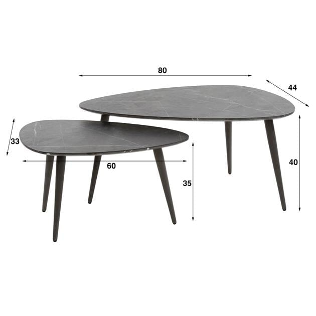 Table basse noir céramique avec cadre en acier dans un décor chic.