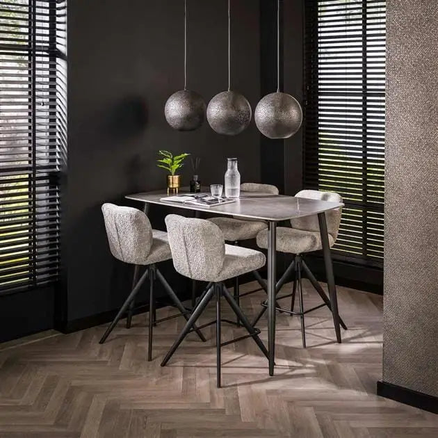 Table haute en céramique grise avec structure métallique élégante