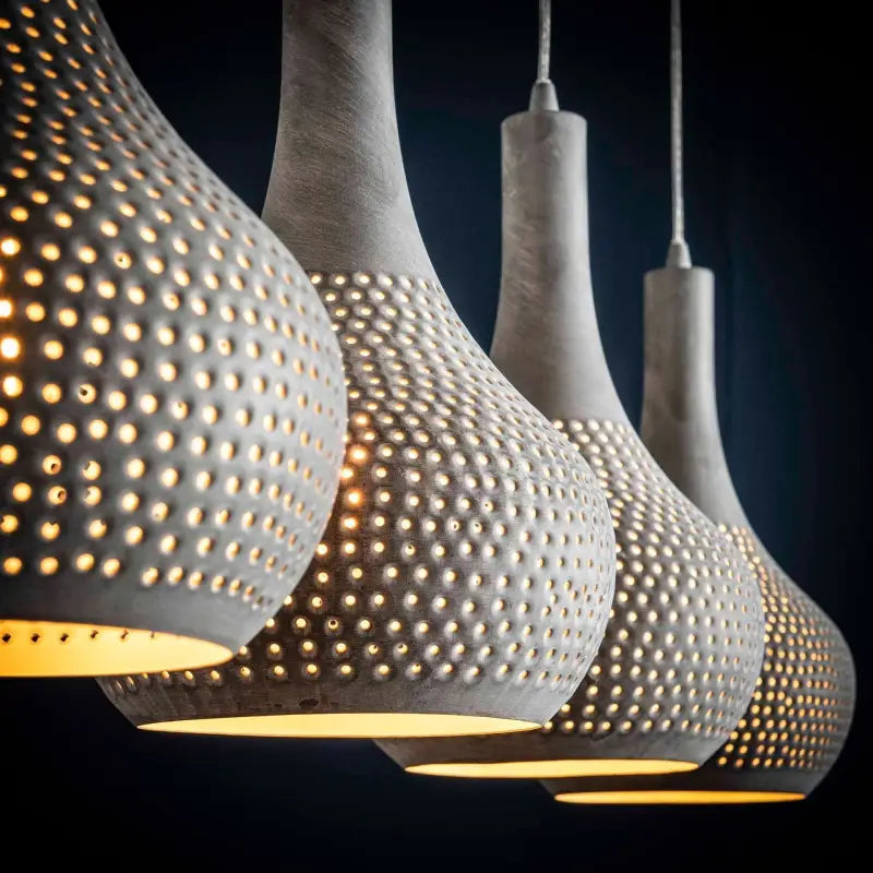 Suspension Contemporaine Métal 4 Lampes Ajourées lyadesign 